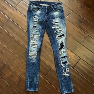 BLANK NYC SIZE 24 Distressed skinny jeans